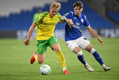 250826 - Cardiff City v Norwich City - Carabao Cup Second Round - Cian Ashford of Cardiff City is challenged by Pelle Mattsson of Norwich
