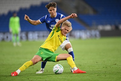 250826 - Cardiff City v Norwich City - Carabao Cup Second Round - Cian Ashford of Cardiff City is challenged by Pelle Mattsson of Norwich
