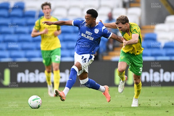 250826 - Cardiff City v Norwich City - Carabao Cup Second Round - Chris Willock of Cardiff City is challenged by Jack Stacey of Norwich