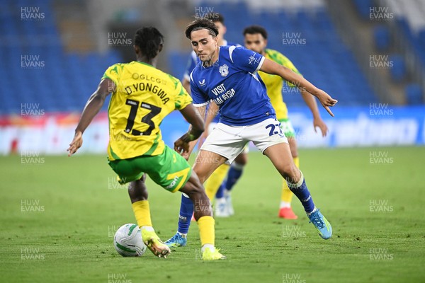 250826 - Cardiff City v Norwich City - Carabao Cup Second Round - Joel Colwill of Cardiff City is challenged by Darlin Yongwa of Norwich