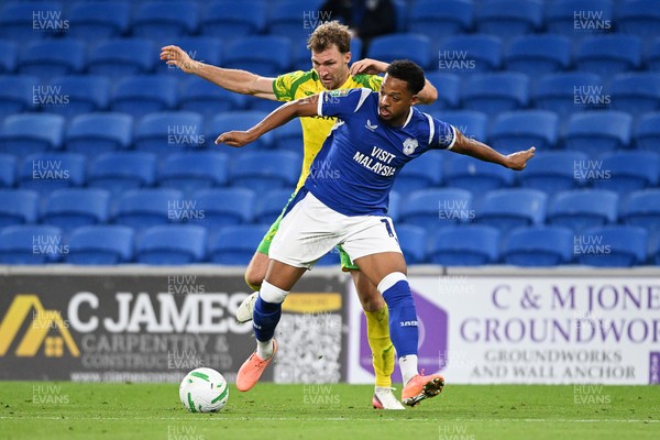 250826 - Cardiff City v Norwich City - Carabao Cup Second Round - Chris Willock of Cardiff City is challenged by Jack Stacey of Norwich
