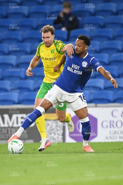 250826 - Cardiff City v Norwich City - Carabao Cup Second Round - Chris Willock of Cardiff City is challenged by Jack Stacey of Norwich