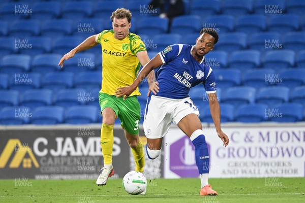 250826 - Cardiff City v Norwich City - Carabao Cup Second Round - Chris Willock of Cardiff City is challenged by Jack Stacey of Norwich