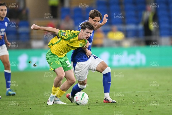 250826 - Cardiff City v Norwich City - Carabao Cup Second Round - Cian Ashford of Cardiff City is challenged by Kellen Fisher of Norwich