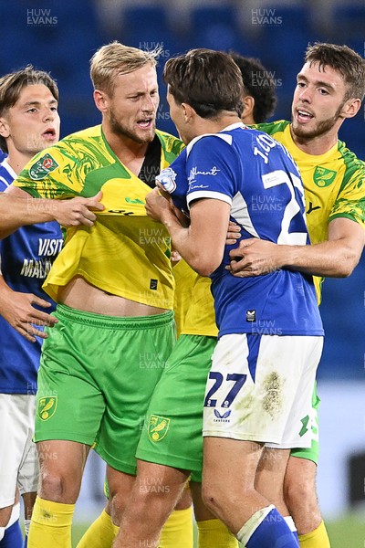 250826 - Cardiff City v Norwich City - Carabao Cup Second Round - Things heat up between Harry Darling of Norwich and Joel Colwill of Cardiff City