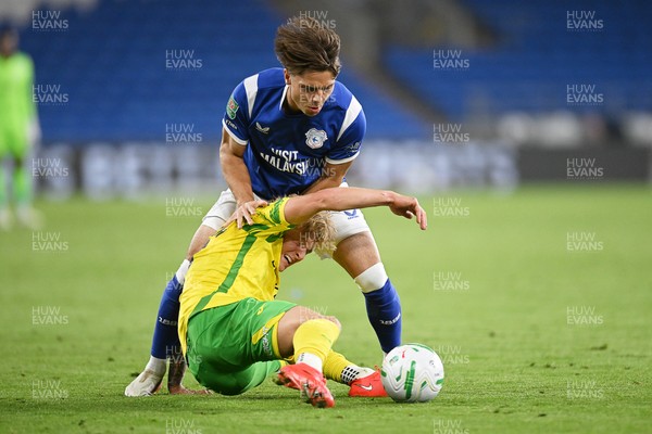 250826 - Cardiff City v Norwich City - Carabao Cup Second Round - Cian Ashford of Cardiff City is challenged by Pelle Mattsson of Norwich
