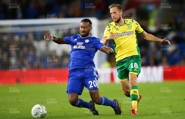 280818 - Cardiff City v Norwich City, Carabao Cup - Loic Damour of Cardiff City is brought down by Marco Stiepermann of Norwich City