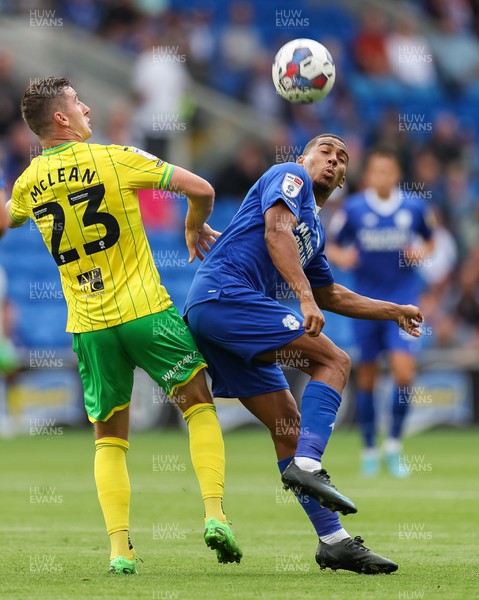 300722 - Cardiff City v Norwich City, Sky Bet Championship - Andy Rinomhota of Cardiff City and Kenny McLean of Norwich City compete for the ball