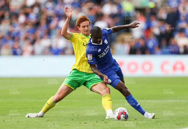 300722 - Cardiff City v Norwich City, Sky Bet Championship - Jamilu Collins of Cardiff City is challenged by Josh Sargent of Norwich City