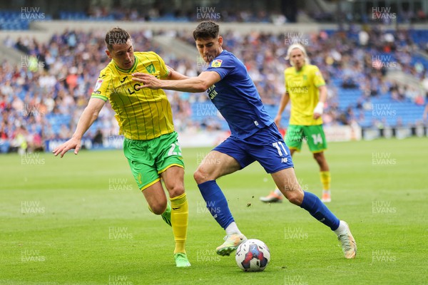 300722 - Cardiff City v Norwich City, Sky Bet Championship - Callum O'Dowda of Cardiff City and Kenny McLean of Norwich City compete for the ball