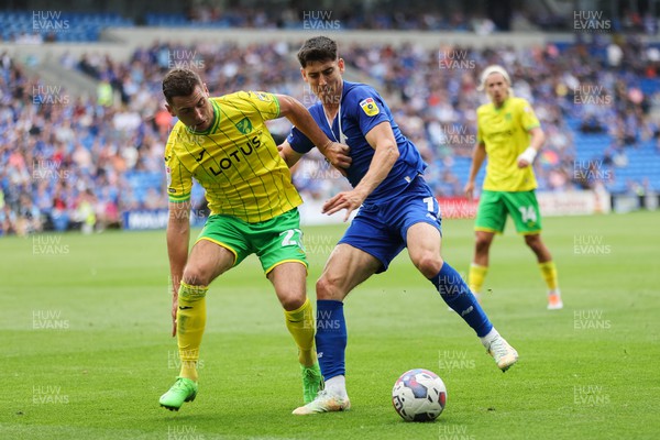 300722 - Cardiff City v Norwich City, Sky Bet Championship - Callum O'Dowda of Cardiff City and Kenny McLean of Norwich City compete for the ball