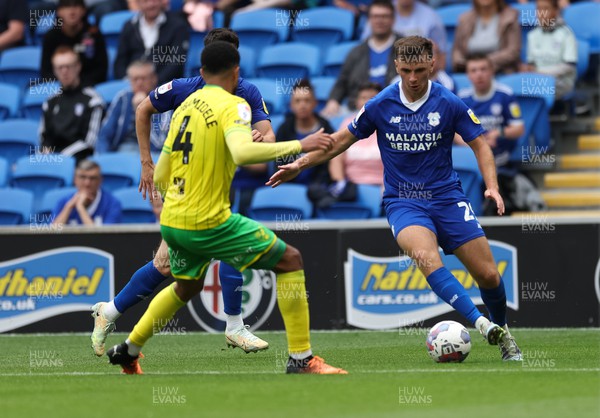 300722 - Cardiff City v Norwich City, Sky Bet Championship - Mark Harris of Cardiff City takes on Andrew Omobamidele of Norwich City