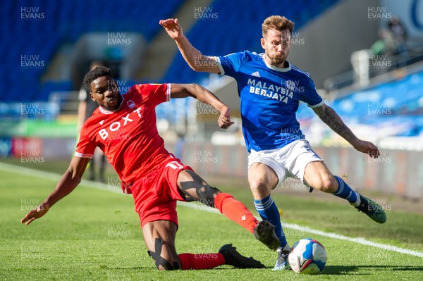 020421 - Cardiff City v Nottingham Forest - Sky Bet Championship - Joe Ralls of Cardiff City is tackled by  Sammy Ameobi of Nottingham Forest