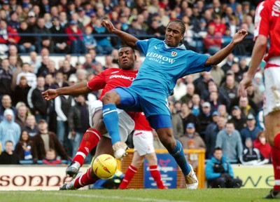 030105 - Cardiff City v Nottingham Forest - Cardiff's Richard Langley takes on Wes Morgan