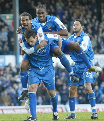 030105 - Cardiff City v Nottingham Forest - Cardiff's Peter Thorne, Jobi McAnuff, Cameron Jerome and Richard Langley celebrate after Thorne scores from the penalty spot