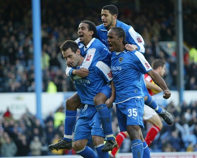 030105 - Cardiff City v Nottingham Forest - Cardiff's Peter Thorne, Jobi McAnuff, Cameron Jerome and Richard Langley celebrate after Thorne scores from the penalty spot