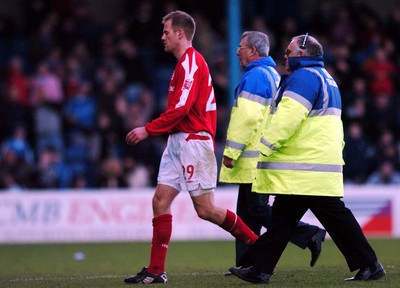 030105 - Cardiff City v Nottingham Forest - Forest's Jon Hjelde is escorted from the pitch after being sent off for a challenge on Richard Langley