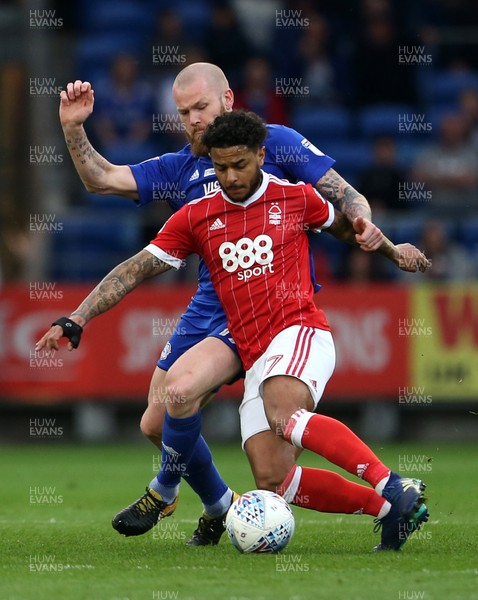 210418 - Cardiff City v Nottingham Forest - SkyBet Championship - Liam Bridcutt of Nottingham Forest is challenged by Aron Gunnarsson of Cardiff City