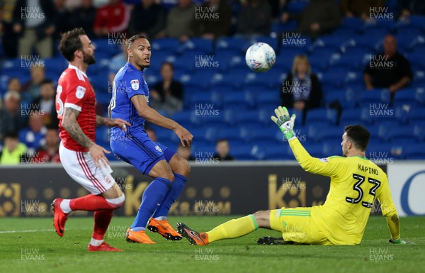 210418 - Cardiff City v Nottingham Forest - SkyBet Championship - Kenneth Zohore of Cardiff City thinks he's done enough to clear the keeper and score