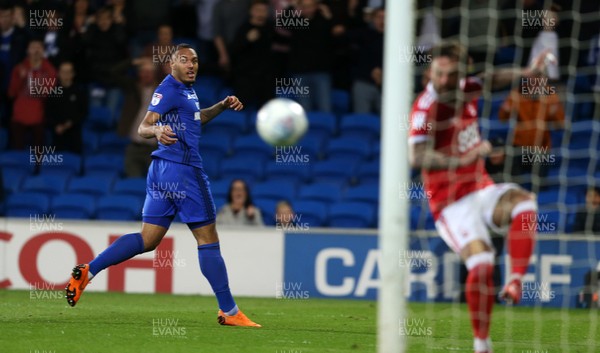 210418 - Cardiff City v Nottingham Forest - SkyBet Championship - Kenneth Zohore of Cardiff City watches as Danny Fox of Nottingham Forest clears the ball out of the empty goal mouth
