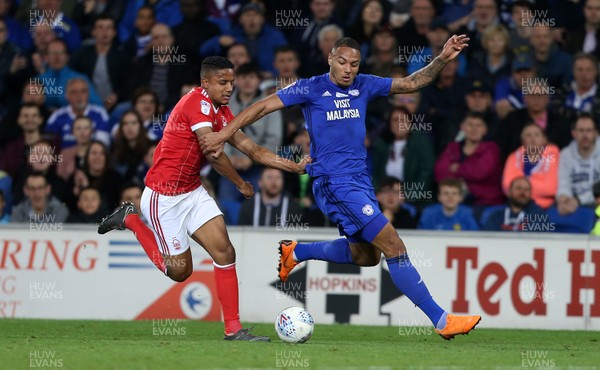 210418 - Cardiff City v Nottingham Forest - SkyBet Championship - Kenneth Zohore of Cardiff City is tackled by Michael Mancienne of Nottingham Forest