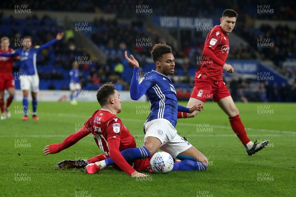 250220 - Cardiff City v Nottingham Forest - SkyBet Championship - Josh Murphy of Cardiff City is tackled by Matty Cash of Nottingham Forest
