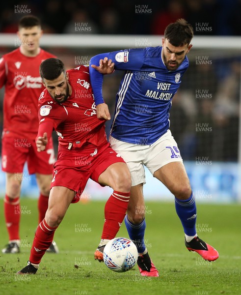 250220 - Cardiff City v Nottingham Forest - SkyBet Championship - Marlon Pack of Cardiff City is challenged by Tiago Silva of Nottingham Forest