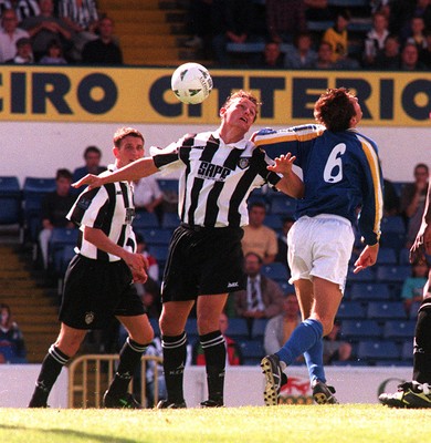 300897 - Cardiff City v Notts County - Ian Richardson gets clear of Cardiffs Jason Fowler