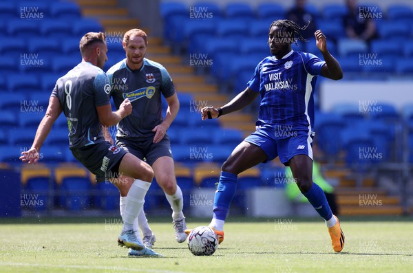 010723 - Cardiff City v Penybont FC - Pre Season Friendly - Sheyi Ojo of Cardiff City is challenged by Lewis Harling of Penybont FC 