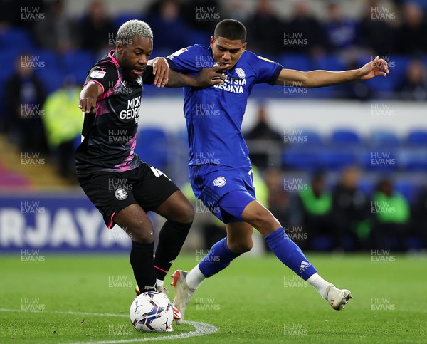 090222 - Cardiff City v Peterborough United - SkyBet Championship - Jeando Fuchs of Peterborough United is tackled by Cody Drameh of Cardiff City