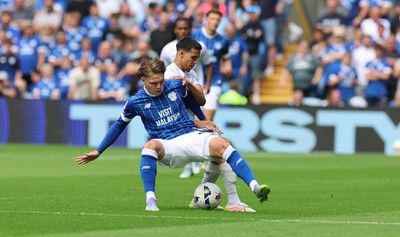 020825 - Cardiff City v Peterborough United, EFL Sky Bet League 1 - Cian Ashford of Cardiff City is challenged by Brandon Khela of Peterborough United