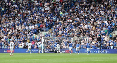 020825 - Cardiff City v Peterborough United, EFL Sky Bet League 1 - Cardiff City fans look on as Bradley Ihionvien of Peterborough United scores from the penalty spot and Cardiff City concede their first goal in the EFL League 1 