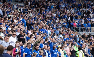 020825 - Cardiff City v Peterborough United, EFL Sky Bet League 1 - Cardiff City fans watch as Cardiff City prepare to play their first match in EFL League One