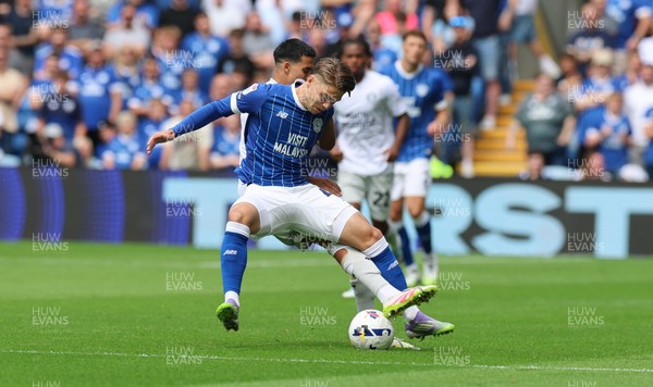 020825 - Cardiff City v Peterborough United, EFL Sky Bet League 1 - Cian Ashford of Cardiff City is challenged by Brandon Khela of Peterborough United