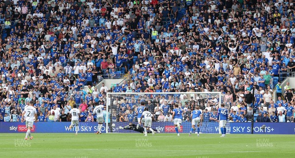 020825 - Cardiff City v Peterborough United, EFL Sky Bet League 1 - Cardiff City fans look on as Bradley Ihionvien of Peterborough United scores from the penalty spot and Cardiff City concede their first goal in the EFL League 1 