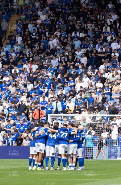 020825 - Cardiff City v Peterborough United, EFL Sky Bet League 1 - Cardiff City huddle up as they prepare to play their first match in EFL League One