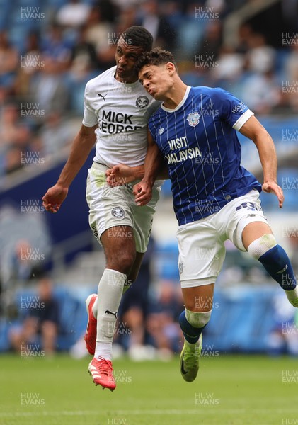 020825 - Cardiff City v Peterborough United, EFL Sky Bet League 1 - Yousef Salech of Cardiff City and David Okagbue of Peterborough United compete for the ball