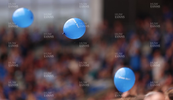 020825 - Cardiff City v Peterborough United, EFL Sky Bet League 1 -  Cardiff City fans release balloons printed with the hashtag TanOut, as a protest against owner Vincent Tan
