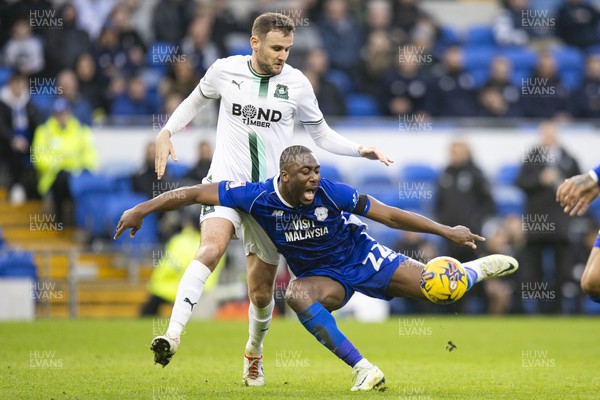 261223 - Cardiff City v Plymouth Argyle - Sky Bet Championship - Yakou Meite of Cardiff City in action against Macaulay Gillesphey of Plymouth Argyle