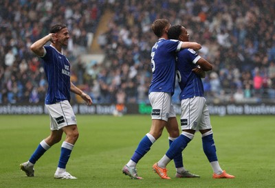 300825 - Cardiff City v Plymouth Argyle, SkyBet League One - Chris Willock of Cardiff City celebrates scoring a goal with team mates