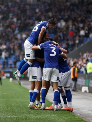 300825 - Cardiff City v Plymouth Argyle, SkyBet League One - Chris Willock of Cardiff City celebrates scoring a goal with team mates