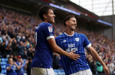 300825 - Cardiff City v Plymouth Argyle, SkyBet League One - Rubin Colwill of Cardiff City celebrates scoring a goal with team mates Ryan Wintle of Cardiff City 