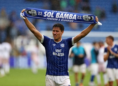 300825 - Cardiff City v Plymouth Argyle, SkyBet League One - Rubin Colwill of Cardiff City holds up a Sol Bamba scarf at full time