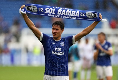 300825 - Cardiff City v Plymouth Argyle, SkyBet League One - Rubin Colwill of Cardiff City holds up a Sol Bamba scarf at full time