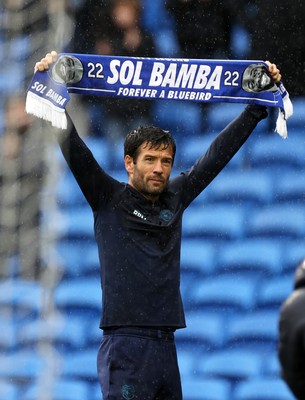 300825 - Cardiff City v Plymouth Argyle, SkyBet League One - Cardiff City Manager Brian Barry-Murphy holds up a Sol Bamba scarf at full time