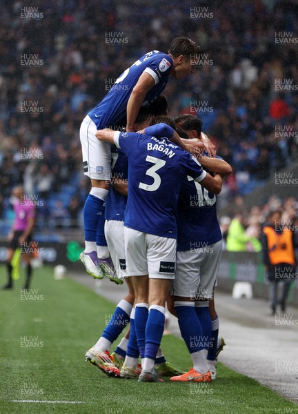 300825 - Cardiff City v Plymouth Argyle, SkyBet League One - Chris Willock of Cardiff City celebrates scoring a goal with team mates