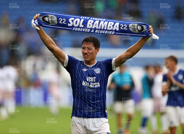 300825 - Cardiff City v Plymouth Argyle, SkyBet League One - Rubin Colwill of Cardiff City holds up a Sol Bamba scarf at full time