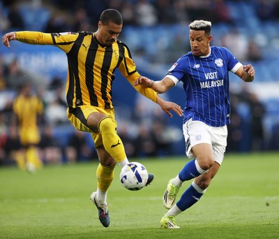 220426 - Cardiff City v Port Vale FC - SkyBet League One - Cameron Humphreys of Port Vale is challenged by Callum Robinson of Cardiff City 