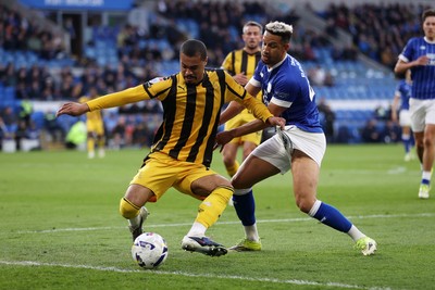 220426 - Cardiff City v Port Vale FC - SkyBet League One - Cameron Humphreys of Port Vale is challenged by Callum Robinson of Cardiff City 