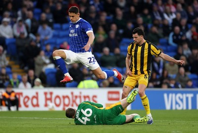 220426 - Cardiff City v Port Vale FC - SkyBet League One - Yousef Salech of Cardiff City is challenged by Joe Gauci of Port Vale 